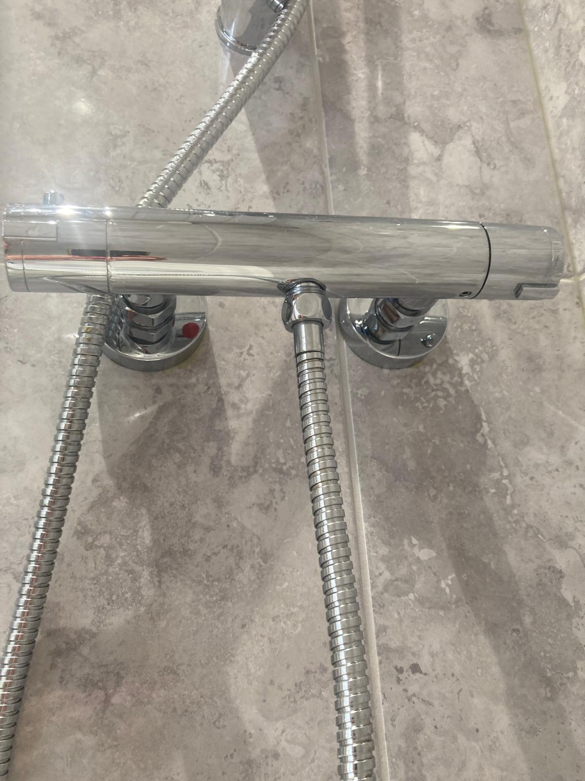 Cleaner sanitising bathroom tiles and grout in Southsea