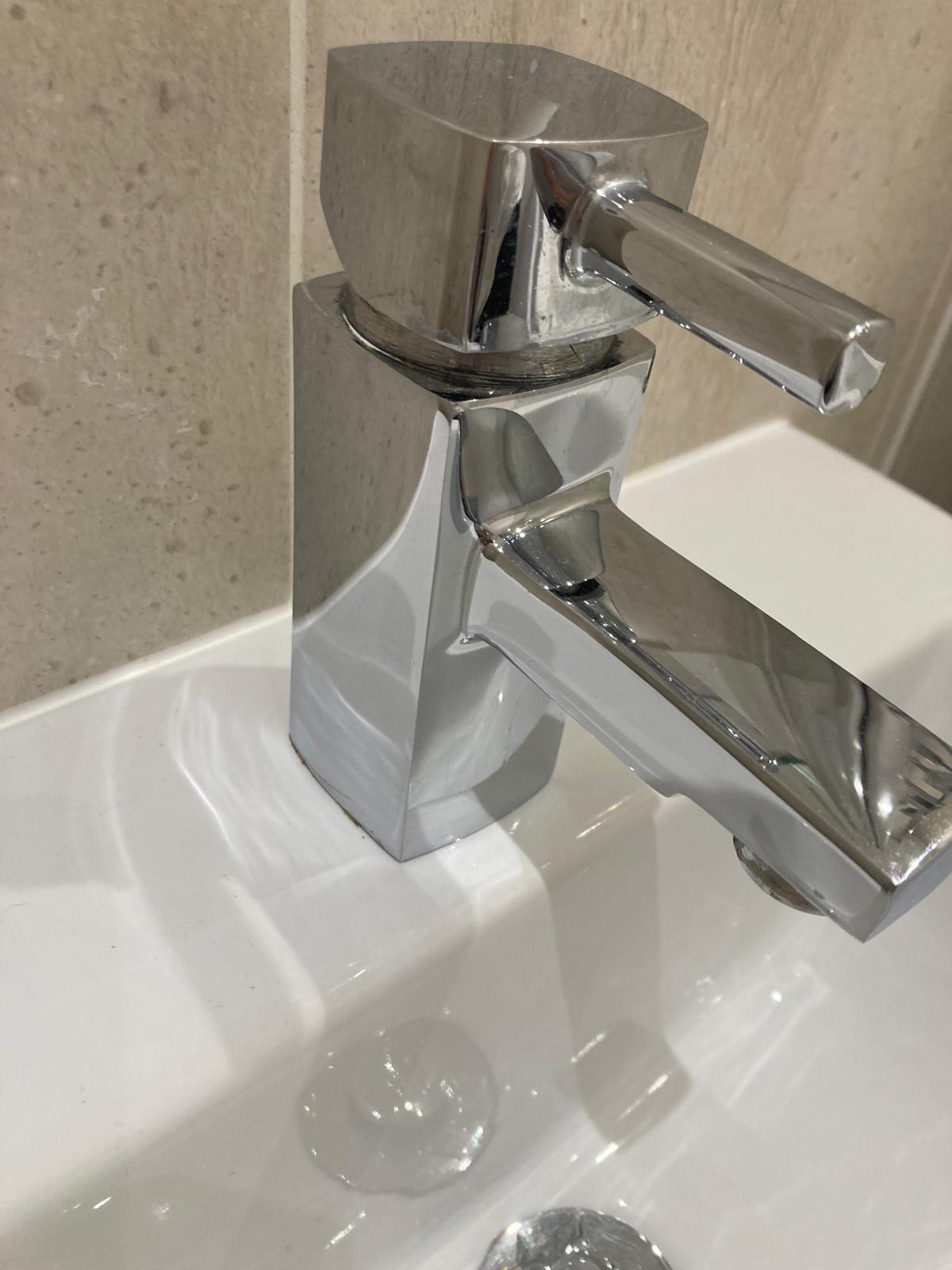 Shiny stainless steel tap after deep cleaning by Serene Clean