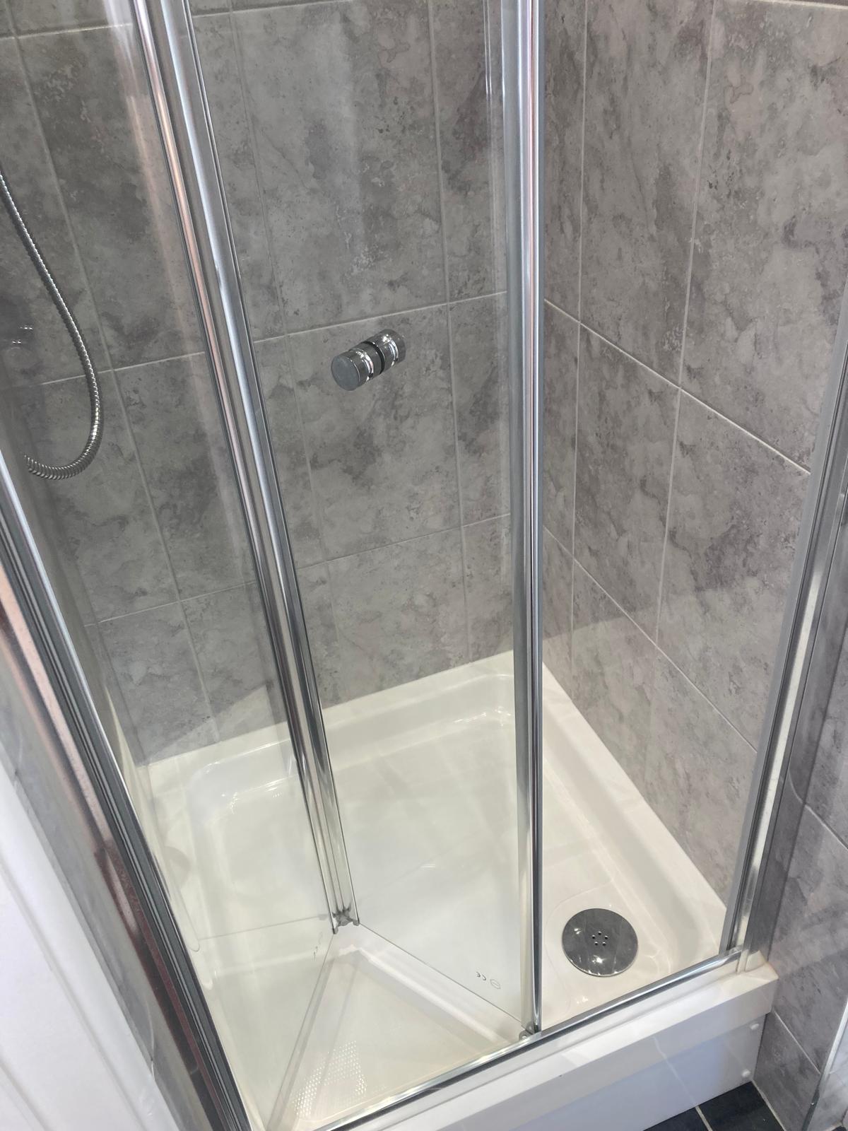 Bathroom floor mopped and sanitised after tenancy clean